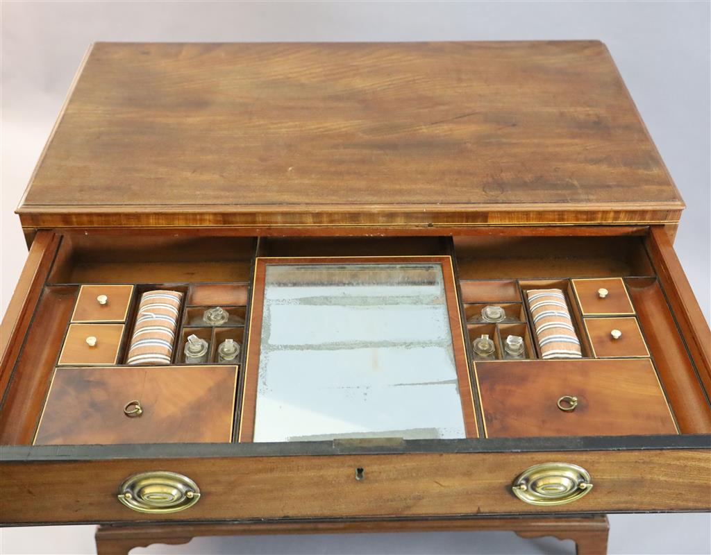 A George III mahogany dressing chest, W.3ft 1in. D.1ft 9in. H.2ft 10in.